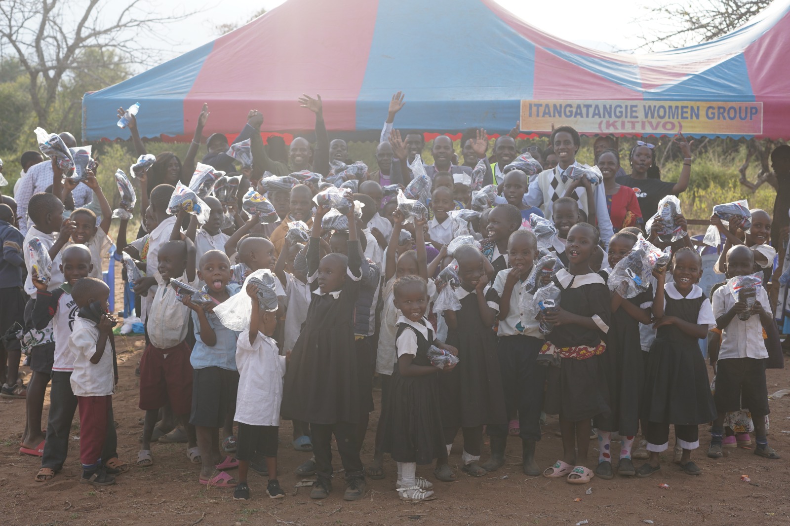 THE IVUUNI  PRIMARY PUPILS EXPRESSING THEIR HAPPINESS